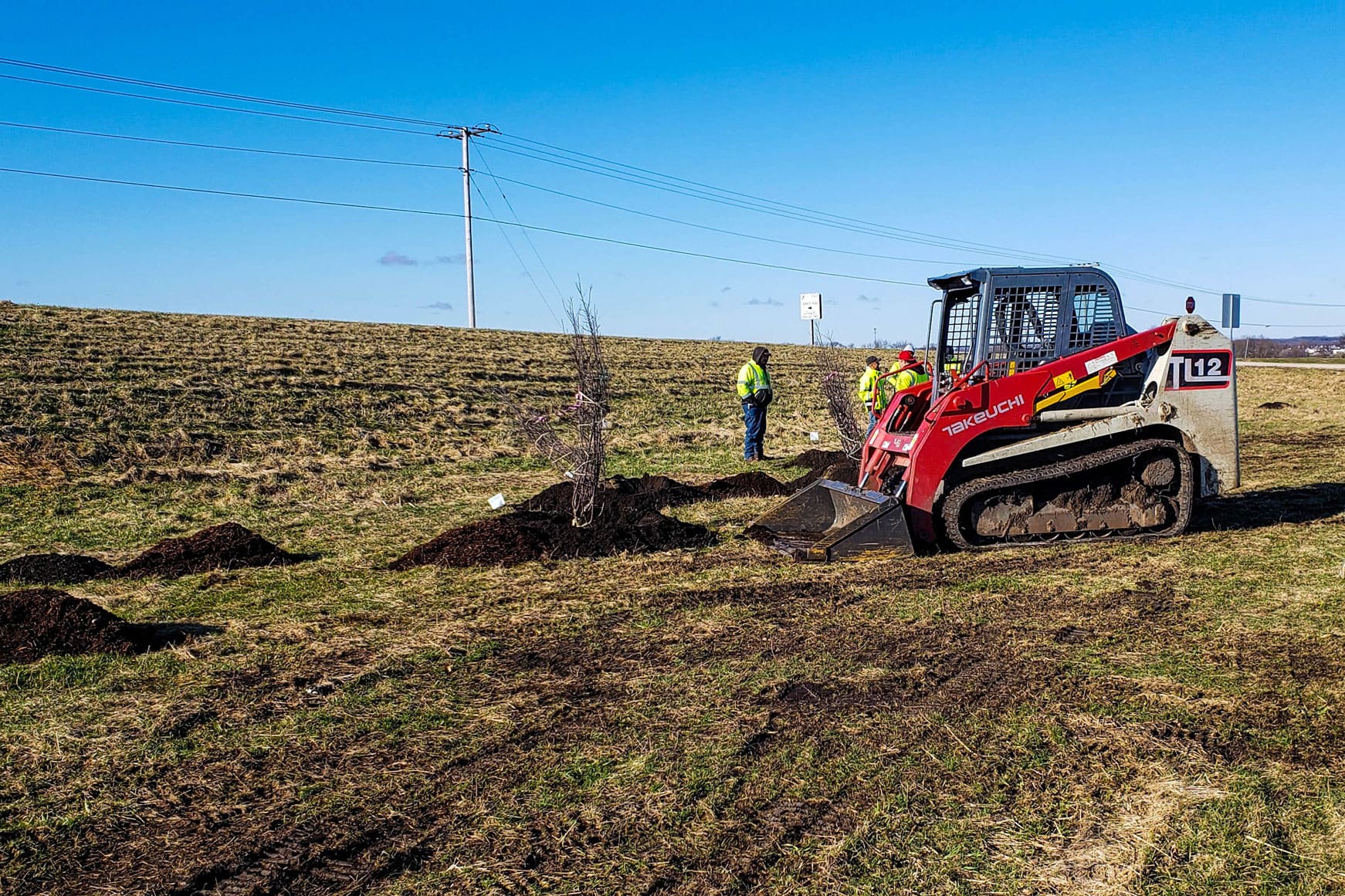 upland Illinois tollway landscape loader